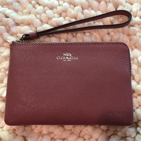 Coach Handbags - Coach corner zip wristlet - dusty rose leather